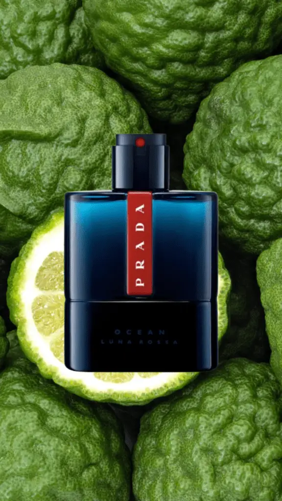 A sleek bottle of Prada Luna Rossa Ocean, featuring a deep blue gradient glass design with a bold red stripe, embodying a fresh and sophisticated marine-inspired fragrance.